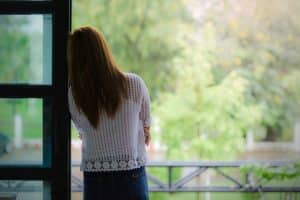 woman looking away, lonely, isolated, depressed, discouraged, how to hope in God