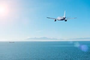 plane flying over open ocean, how to make big changes in life, grow as a Christian